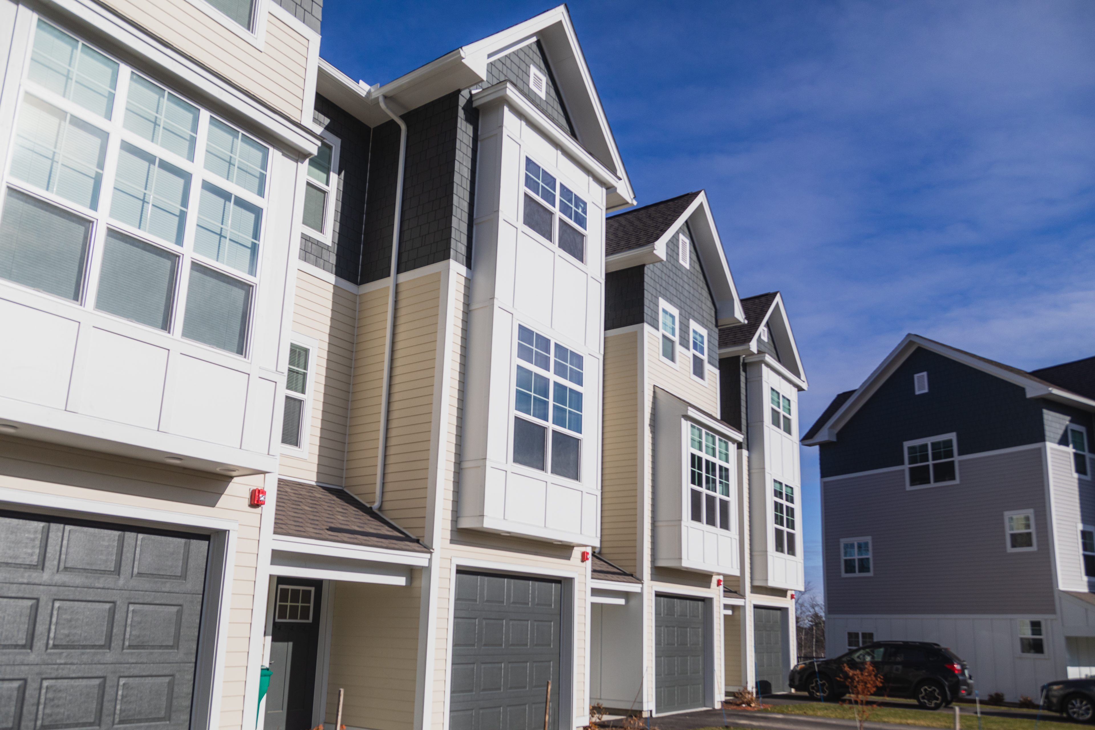 A row of modern houses with garages.